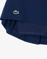 FALDA LACOSTE GOLF